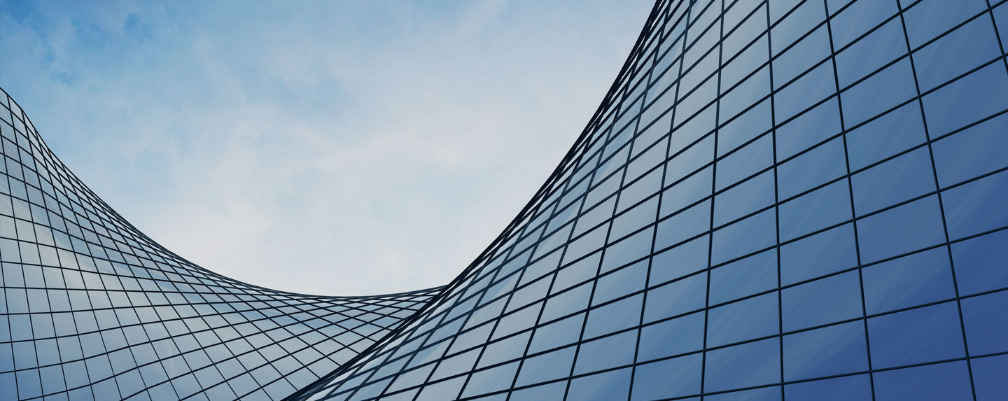 Image of giant glass windows on side of building