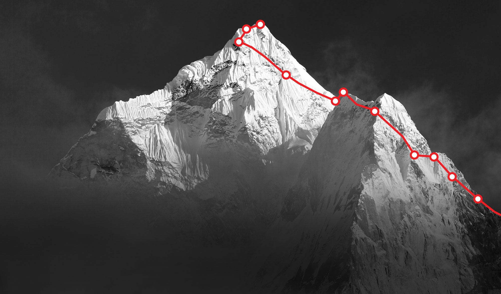 Image of mountain with a path marked using lines and circles across the ridge