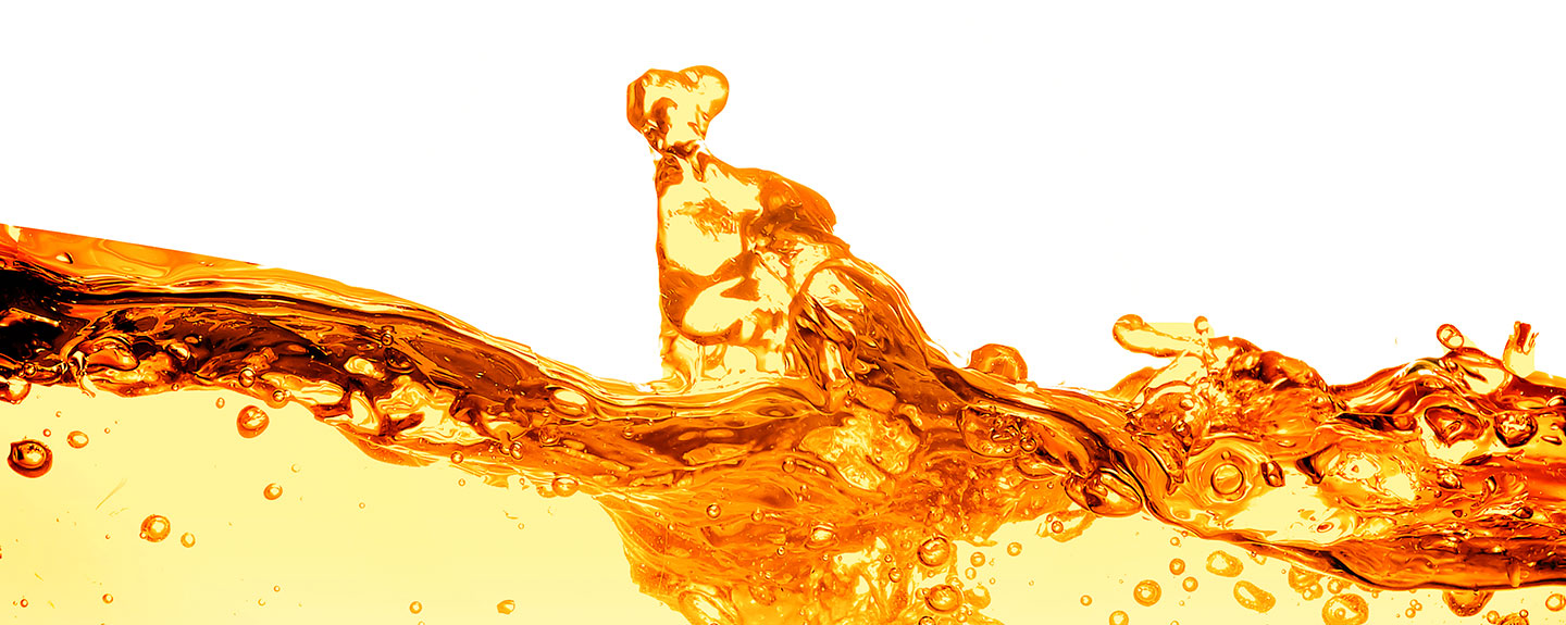 top of orange liquid splashing on white background