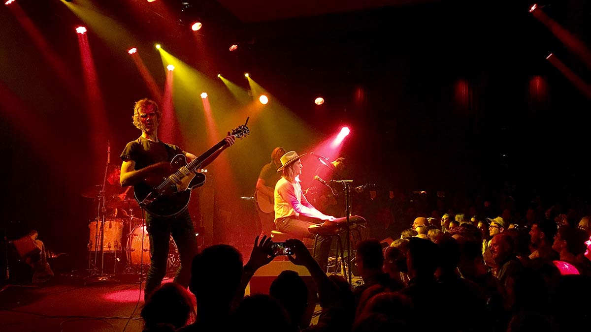 Photo of band playing on stage