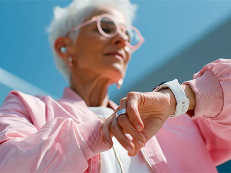 woman looking at watch