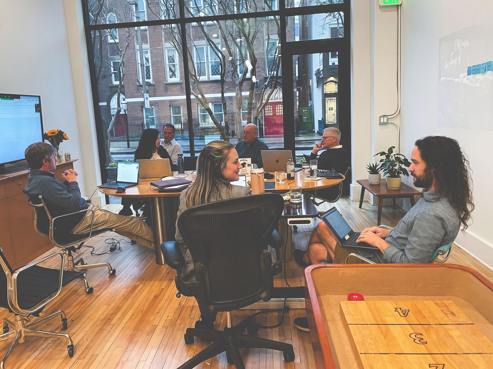 people around a conference table